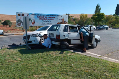 Otomobiller kavşakta çarpışıp, refüje çıktı: 2 yaralı