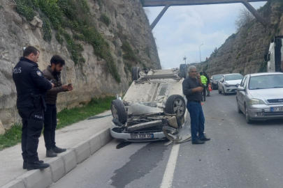 Devrilen otomobilin sürücüsü yaralandı