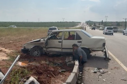 Kaza yaptığı aracının başında gözyaşı döktü
