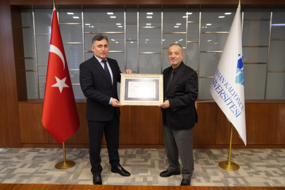 HKÜ'ye iş yeri açma belgesi hakkı